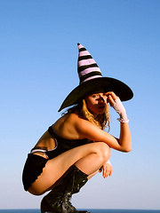 Erotic picture of Black boots, a cute black dress and a sexy blonde babe is all it takes to make you go mad while viewing the images.