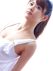 Erotic picture of Saki Yamaguchi Asian spoils leering body in water with petals