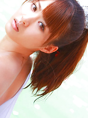 Erotic picture of Saki Yamaguchi Asian spoils leering body in water with petals