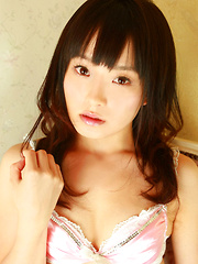 Erotic picture of Kana Moriyama Asian takes uniform off piece by piece at window