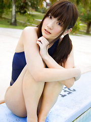 Erotic picture of Anna Nakagawa Asian touches pussy in bath suit of the pool bars