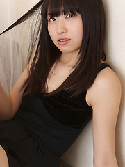 Erotic picture of Hijiri Sachi Asian shows sexy legs under dress and plays a lot