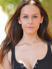 Erotic picture of Kara shows off her sweet boobs