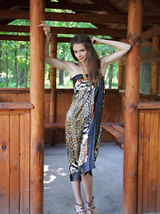 Erotic picture of Sultry seductress Loretta A showcases her stunning tight body with ever-erect breasts, slim waist, and long, svelte legs.