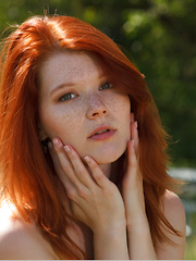 Erotic picture of A dip-dyed blue sarong wrapped around Mia Sollis' curvy body helps bring out her striking red hair and gorgeous fair porcelain skin with delightfully pink and puffy bits.