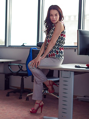 Erotic picture of Nici Dee portrays a corporate hottie who loves loves seducing new hires into her private office for a 'closed-door meeting'.