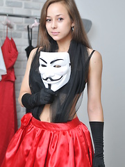 Erotic picture of She starts out in a hot dress that she loves to show her body in, but she is too naughty to keep it on.