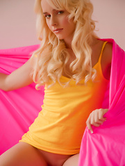 Erotic picture of Kara Duhe gets horny on the chair shows off her stretched, pink pussy