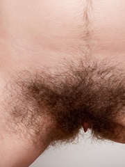 Erotic picture of Camille gets naked on yoga mat showing off body