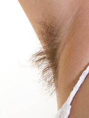 Erotic picture of Baby Lizza strips naked and plays naked on bed