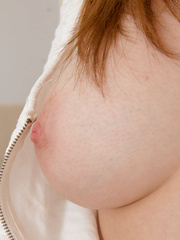 Erotic picture of She makes a hot hobby out of doing incredible stripteases and showing off her lovely little pink pussy.