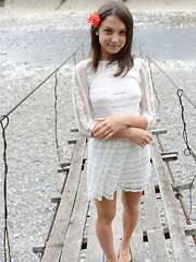 Erotic picture of She feels a great joy as she shows something new and amazing that she had hidden right between those long legs.