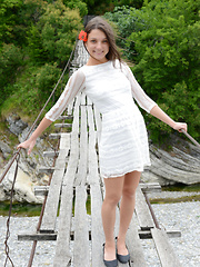 Erotic picture of She feels a great joy as she shows something new and amazing that she had hidden right between those long legs.