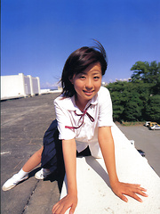 Erotic picture of Hitomi Kitamura Asian with big assets loves biking and pictures