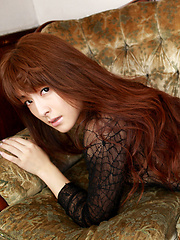 Erotic picture of Rika Kawamura Asian shows cunt in spider lace crotchless outfit