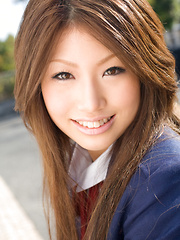 Erotic picture of Risa Aika Asian with cute smile shows crack in thong under skirt