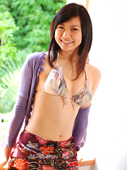 Erotic picture of Konomi Yoshikawa Asian smiles being proud of her lustful curves