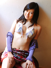 Erotic picture of Konomi Yoshikawa Asian smiles being proud of her lustful curves