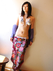 Erotic picture of Konomi Yoshikawa Asian smiles being proud of her lustful curves