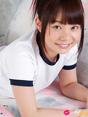 Erotic picture of Mana Asian doll in sports outfit is naughty and shows hot behind